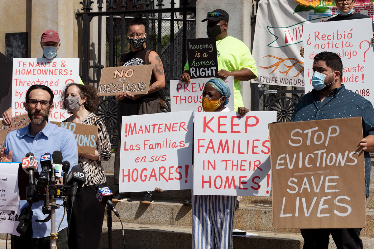 According to an administration official, the Biden administration is expected to announce new efforts aimed at limiting evictions, and pictured, people protesting evictions during a news conference, on July 30, in Boston.