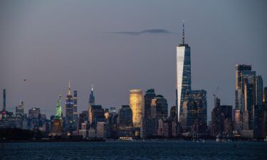 A view of the Manhattan skyline and Statue of Liberty on June 15