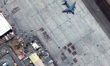 Taliban members escorted Americans who sought to escape Afghanistan to gates at Kabul airport as part of a secret arrangement with the United States. Pictured is Kabul airport on August 23.