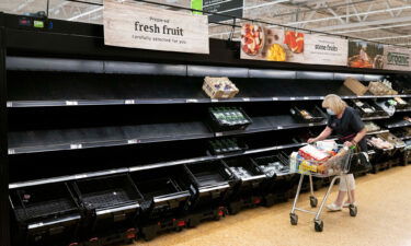 UK worker shortages could cancel Christmas. Brexit and the coronavirus pandemic are to blame. Pictured is a woman shopping in an ASDA store on July 23