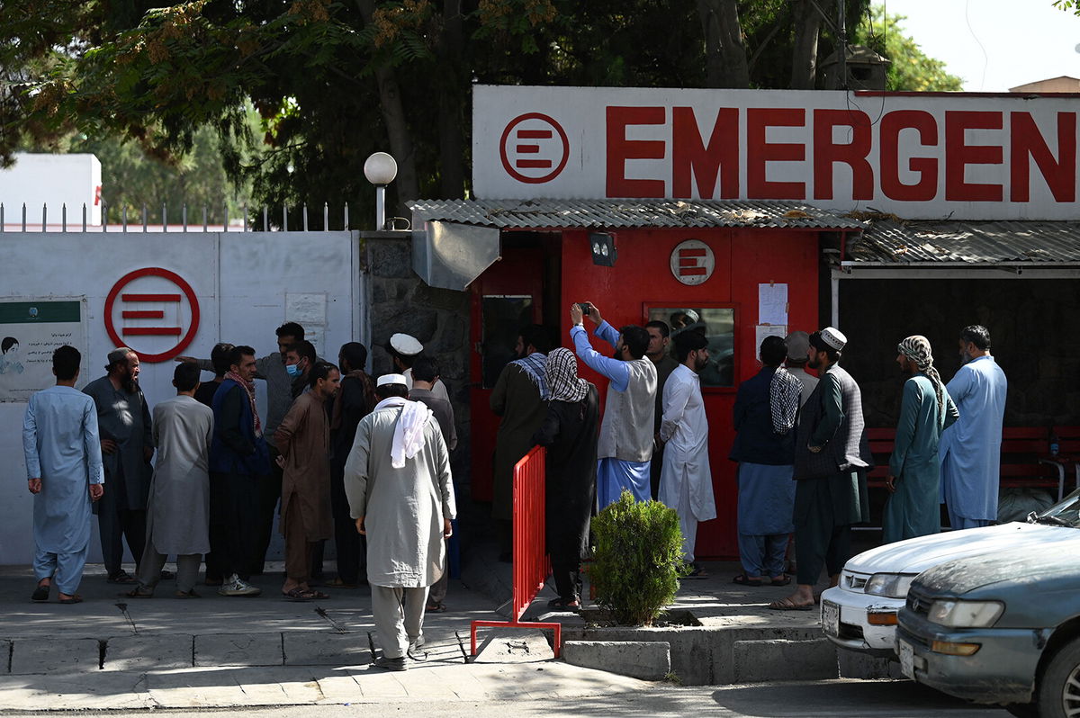 <i>Aamir Quereshi/AFP/Getty Images</i><br/>People gather to check on missing relatives on Friday.