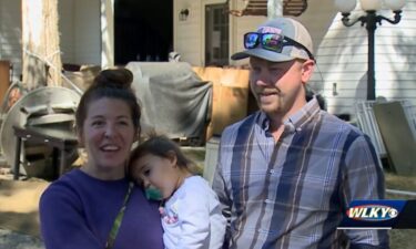 Chas and Melissa Johnson adopted their daughter Lilah in 2019 and want to adopt another child. They held a yard sale to raise money to defray expenses.