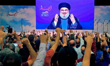 Hezbollah leader Hassan Nasrallah is cheered by supporters during a speech in November 2019.