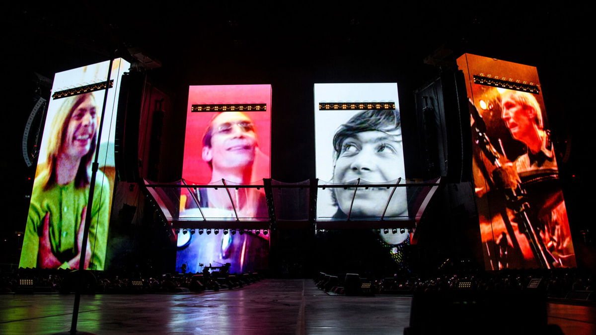 <i>Amy Harris/Invision/AP</i><br/>A video tribute to Charlie Watts plays before the Rolling Stones perform in St. Louis