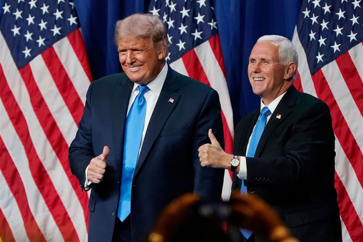 <i>Chris Carlson/Pool/Getty Images</i><br/>Former President Donald Trump and former Vice President Mike Pence give a thumbs up after speaking on the first day of the Republican National Convention at the Charlotte Convention Center on August 24