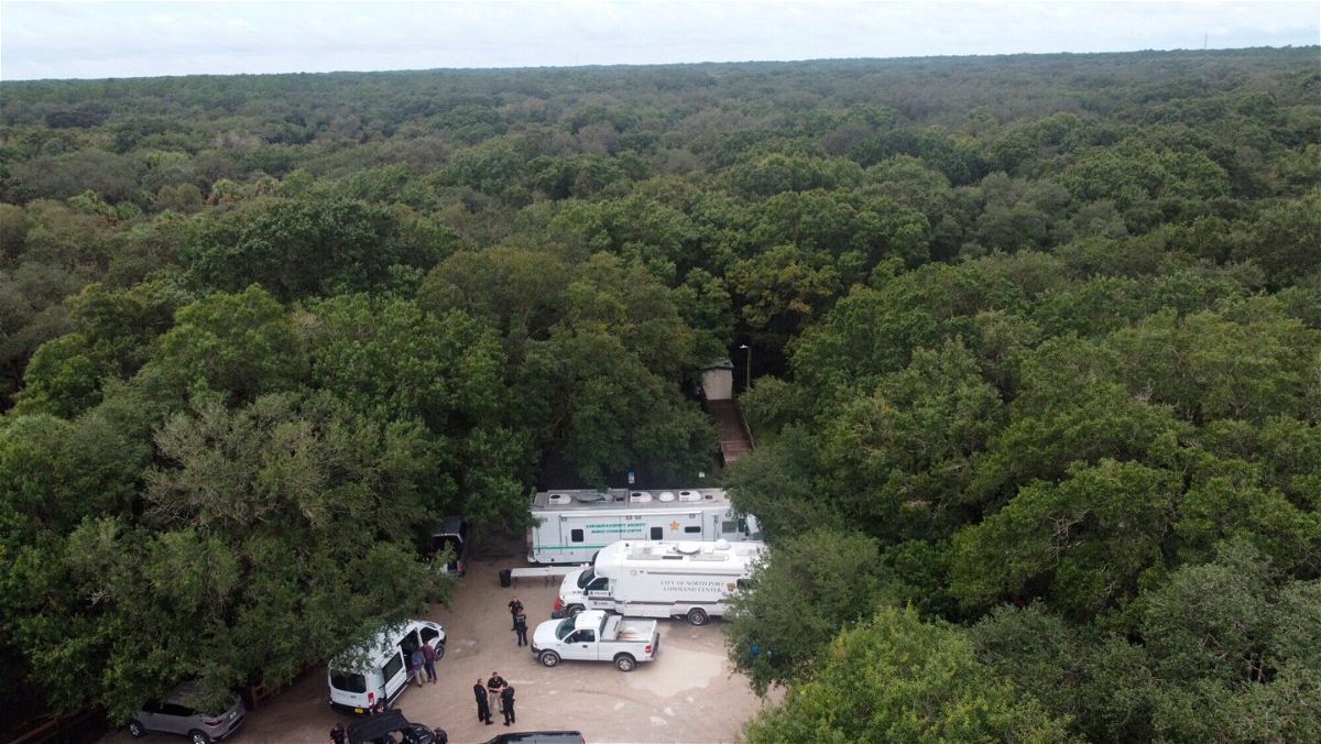 <i>North Port Police Department/AP</i><br/>Law enforcement officials conduct a search of the vast Carlton Reserve in the Sarasota