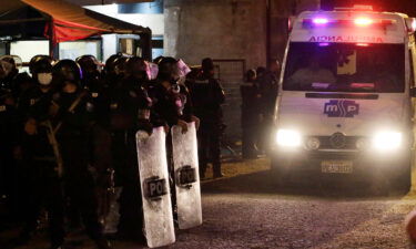 An ambulance leaves from the Litoral penitentiary after a riot