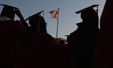 Navient is quitting the federal student loan business. Students at Pasadena City College here participate in the graduation ceremony