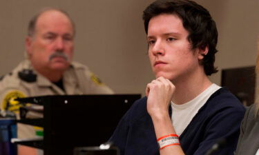 Defendant John Earnest listens during a witness testimony in his preliminary hearing in September 2019