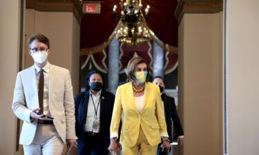 Democrat Sen. Joe Manchin rejects Nancy Pelosi's call for a deal on President Joe Biden's economic package ahead of a key Thursday vote. Pelosi is seen here at the U.S. Capitol on August 24.