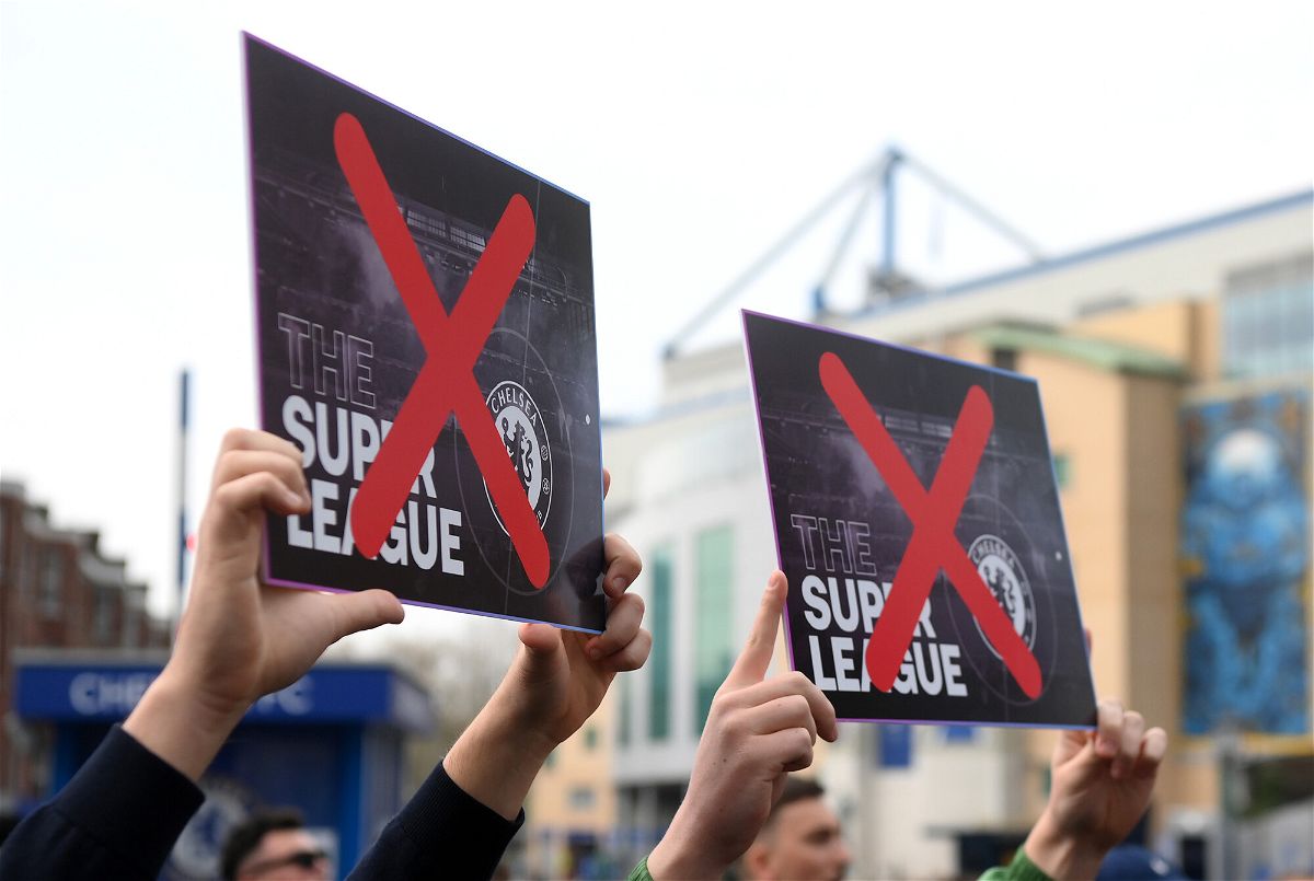 <i>Mike Hewitt/Getty Images</i><br/>Chelsea fans protest against the proposed European Super League prior to the Premier League match between Chelsea and Brighton & Hove Albion at Stamford Bridge on April 20.