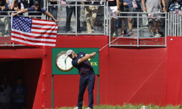 Bryson Dechambeau hits his tee shot on the first hole during the Fourball matches.