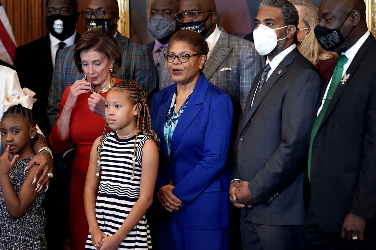 <i>Greg Nash/Pool/ AFP/Getty Images</i><br/>Rep. Karen Bass makes a statement as Speaker Nancy Pelosi