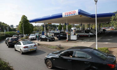 A line of vehicles at a Tesco station in Camberley