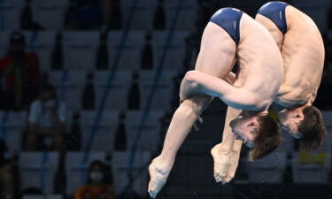 Lee (left) and Daley compete in the men's synchronized 10m platform diving final.