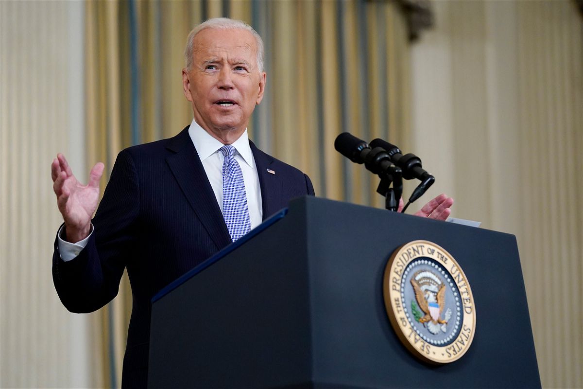 President Joe Biden speaks about the COVID-19 response and vaccinations in the State Dining Room of the White House