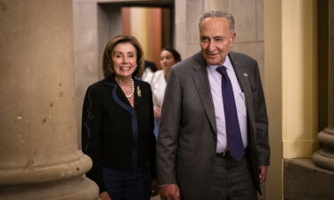 US Speaker of the House Nancy Pelosi (D-CA) and U.S. Senate Majority Leader Chuck Schumer (D-NY) emerge from the Speakers office after a bipartisan group of Senators and White House officials came to an agreement over the Biden administrations proposed infrastructure plan.