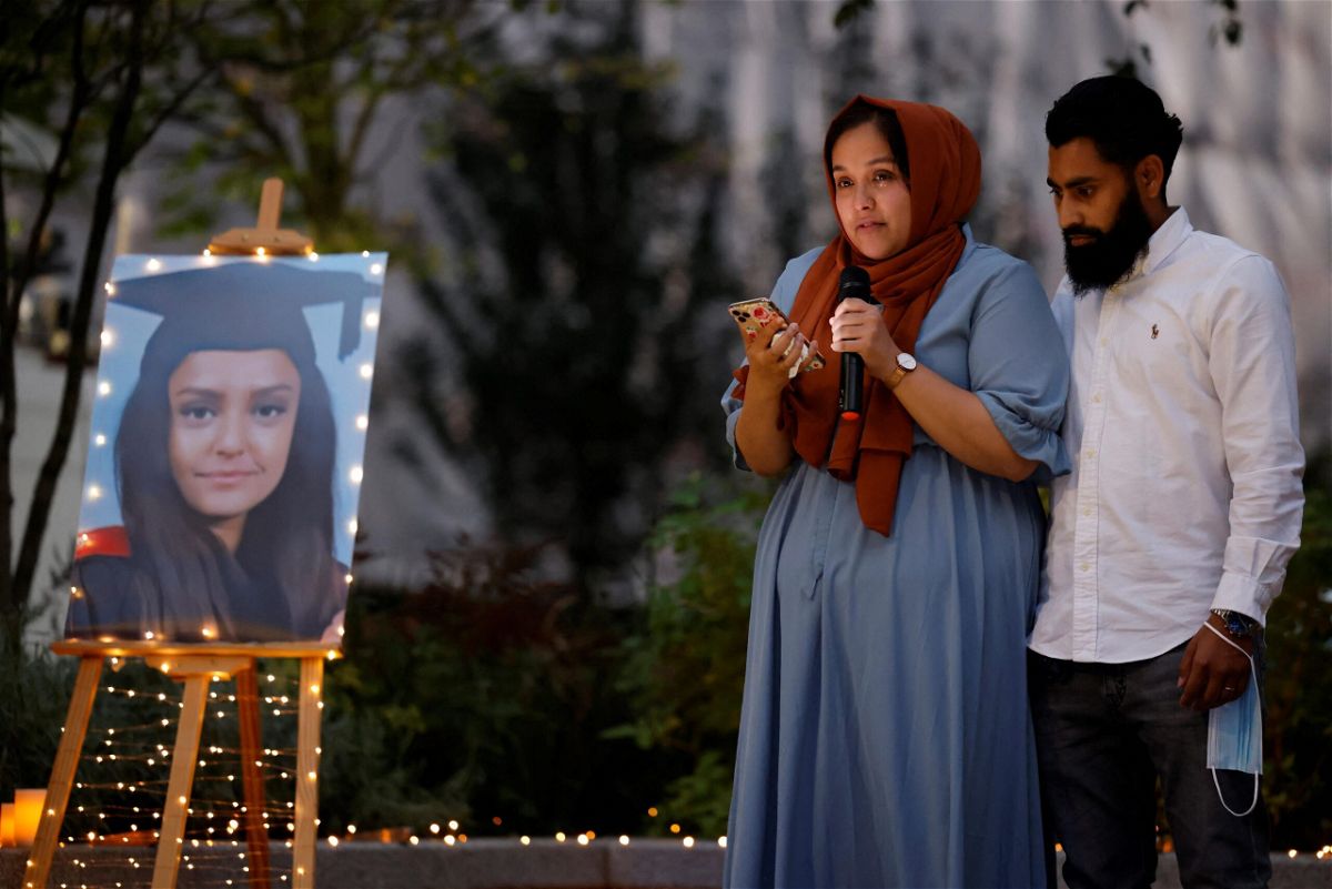 <i>Tolga Akmen/AFP/Getty Images</i><br/>Jebina Nessa pays tribute to her sister Sabina during a vigil in London on September 24.
