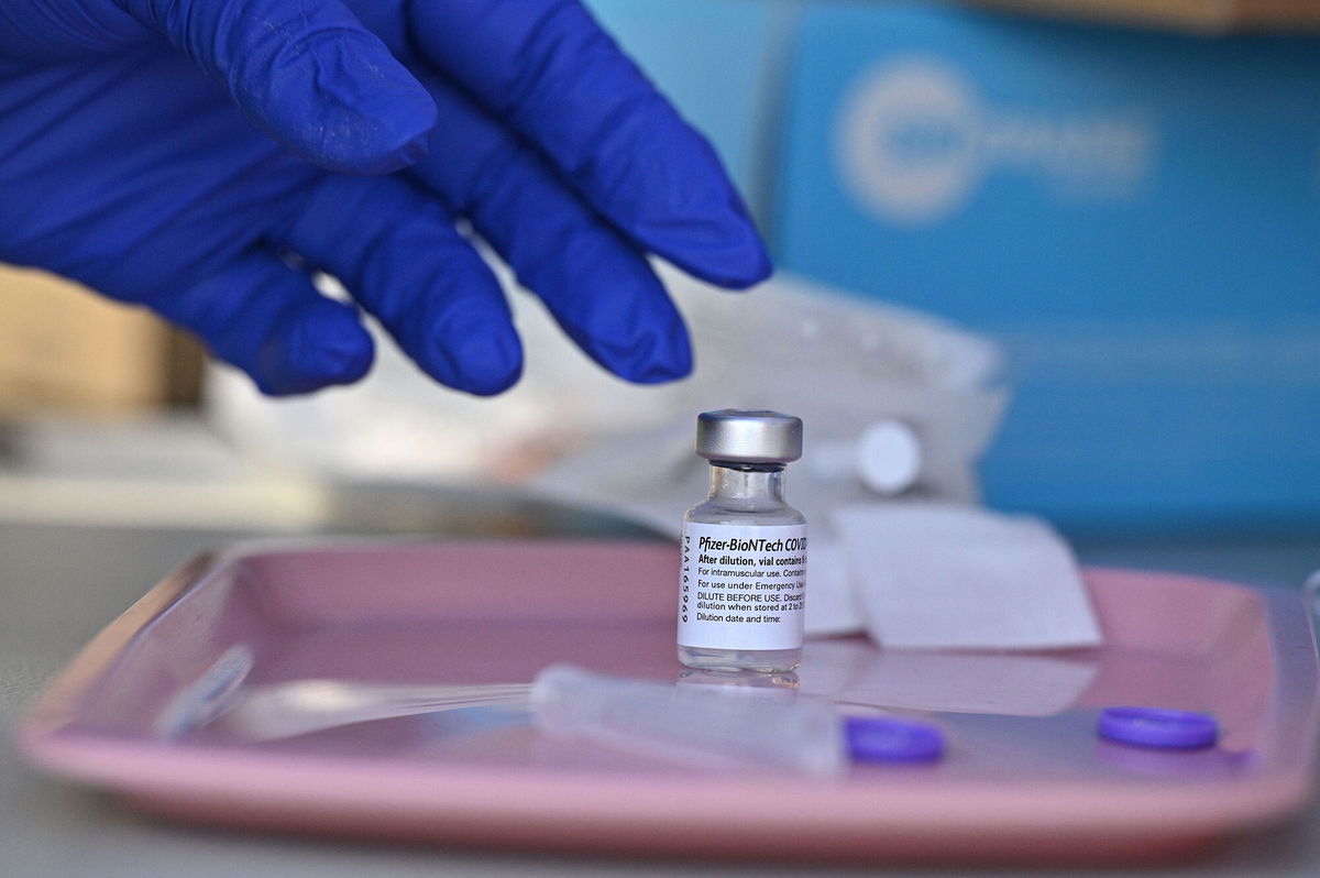 <i>Robyn Beck/AFP/Getty Images</i><br/>Pfizer said on Monday a Phase 2/3 trial showed its Covid-19 vaccine was safe and generated a 