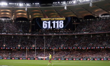 Fans who gathered to watch the match between the Melbourne Demons and the Western Bulldogs on September 25 in Perth