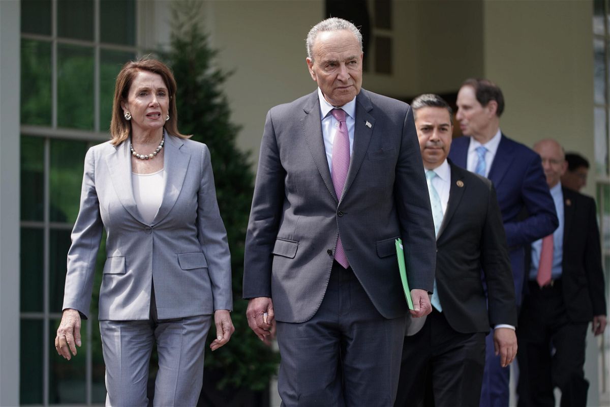 <i>Chip Somodevilla/Getty Images</i><br/>House Speaker Nancy Pelosi and Senate Majority Leader Chuck Schumer are seen here after meeting with other House and Senate Democrats.