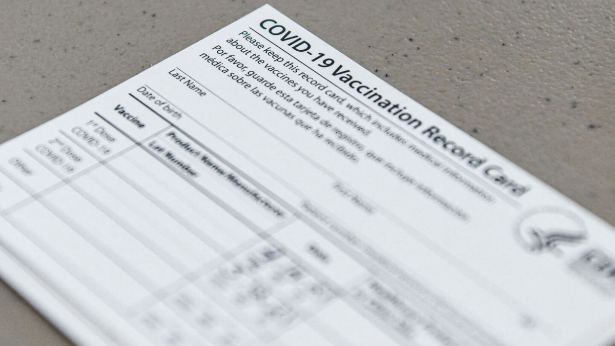 <i>Chandan Khanna/AFP via Getty Images</i><br/>A Covid-19 vaccine record card is seen at Florida Memorial University Vaccination Site in Miami Gardens