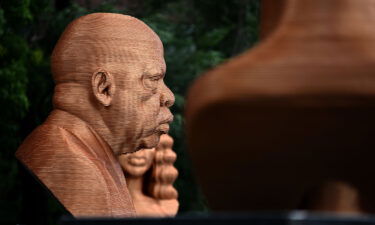 Three bronze busts depicting the late Congressman John Lewis