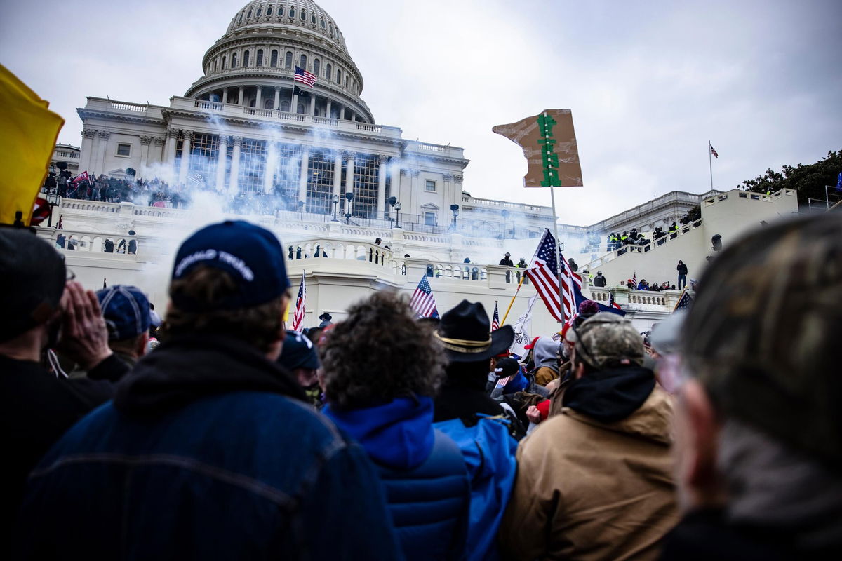 <i>Samuel Corum/Getty Images</i><br/>Pro-Trump supporters storm the U.S. Capitol following a rally with President Donald Trump on January 6