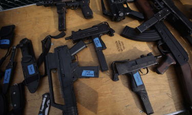 Prop guns are used to make movie scenes look realistic. Gun props are shown here on a table backstage during rehearsal for the play "Coriolanus."