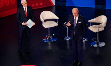 President Joe Biden has for months been circumspect in describing the behind-the-scenes negotiations with Sens. Joe Manchin and Kyrsten Sinema over his sweeping domestic ambitions. He emerged Thursday prepared to spill some of the details.