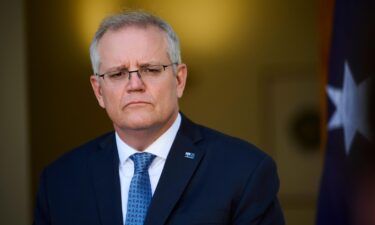 Australia will reopen international borders to fully vaccinated citizens. Australian Prime Minister Scott Morrison is seen here at Parliament House on August 23