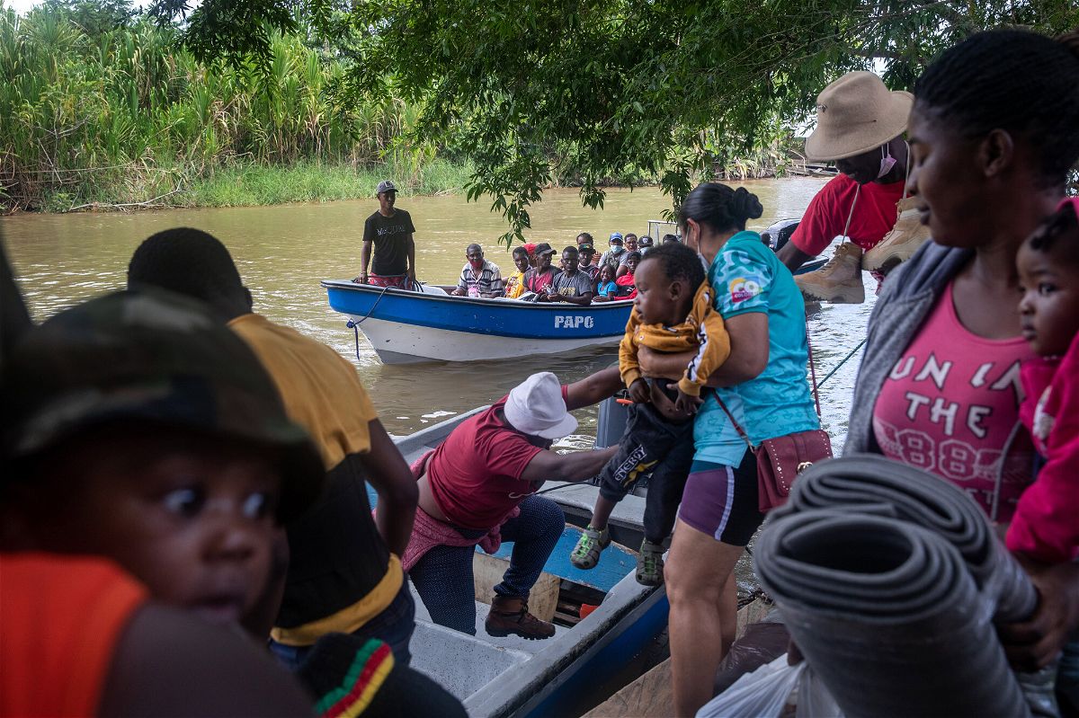 <i>John Moore/Getty Images</i><br/>Haitian immigrants arrive by boat in Acandi