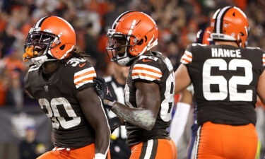 D'Ernest Johnson celebrates with wide receiver Rashard Higgins after rushing for a first-quarter touchdown against the Denver Broncos.