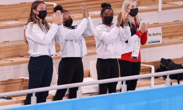 Simone Biles and her teammates cheer during the Tokyo Olympics on July 29 in Japan.