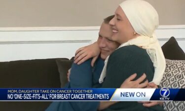 Madeline Debold  (right) holds her mother