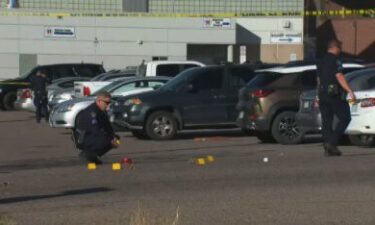 Police investigate the scene where six teeneragers who shot and injured near Aurora Central High School last week.