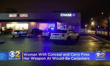 A woman fired at a would-be carjacker when he approached her at gunpoint just as she was getting into her car in the parking lot of the Chase Bank at 10260 S. Michigan Ave.