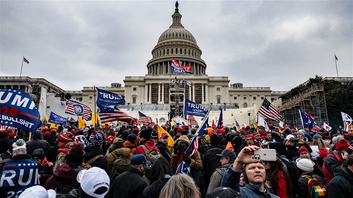 <i>Samuel Corum/Getty Images</i><br/>Pro-Trump supporters storm the U.S. Capitol following a rally with President Donald Trump on January 6