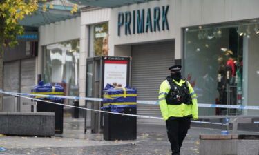 A police cordon Friday near the scene in Liverpool city center where 12-year-old Ava White died following an assault.