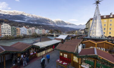 People gather at the annual Christmas market during the first day of a nationwide lockdown for the uninoculated on November 15.