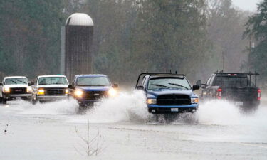 Rescuers in British Columbia are working to reach up to 275 people who have been trapped on a highway as the result of two mudslides