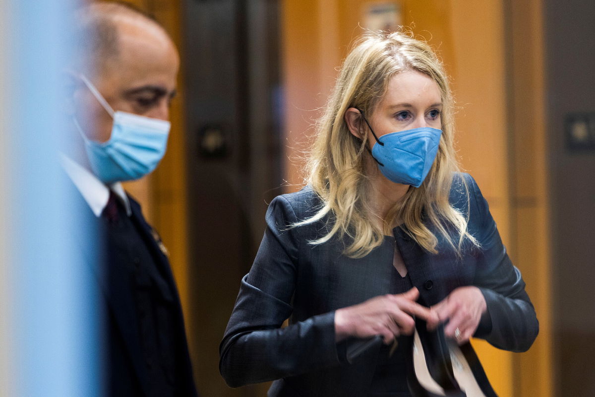 <i>Peter DaSilva/Reuters</i><br/>Theranos founder Elizabeth Holmes collects her belongings after arriving to attend her fraud trial at federal court in San Jose