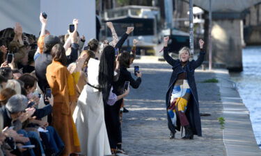 Gabriela Hearst cheers in victory after her latest show for Chloé during Paris Fashion Week