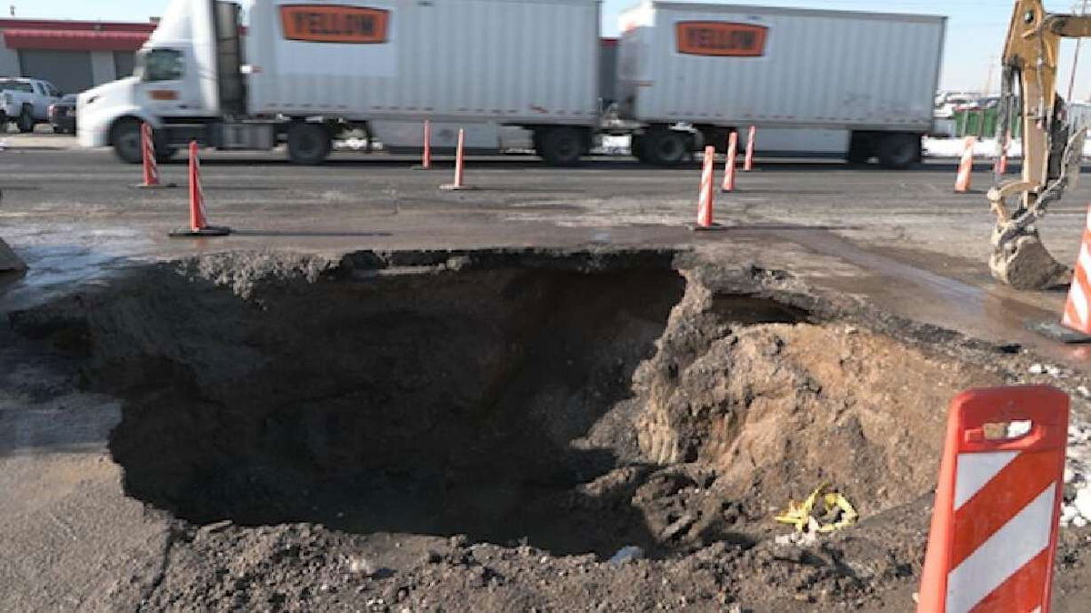 <i>KSL</i><br/>A massive sinkhole in West Valley City