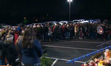 Hundreds of community members attended a candlelight vigil for Rice