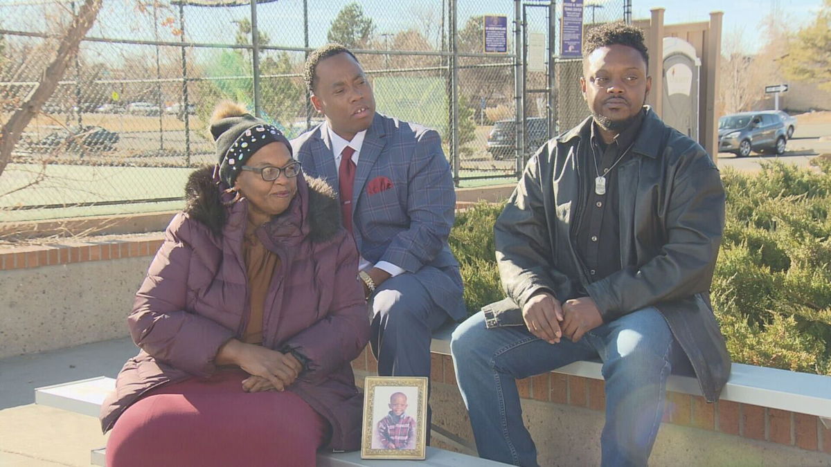 <i>KCNC</i><br/>Sharletta Evans sits Tuesday at Utah Park in Aurora with her son Calvin Hurd