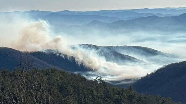 <i>Linville Volunteer Fire Department/WLOS</i><br/>Firefighters and emergency personnel are monitoring a wildfire near Grandfather Mountain that was first reported on Christmas Eve.