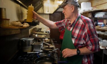 Jim Wilkinson works in the kitchen at HoneyCreek Dining on Thursday.