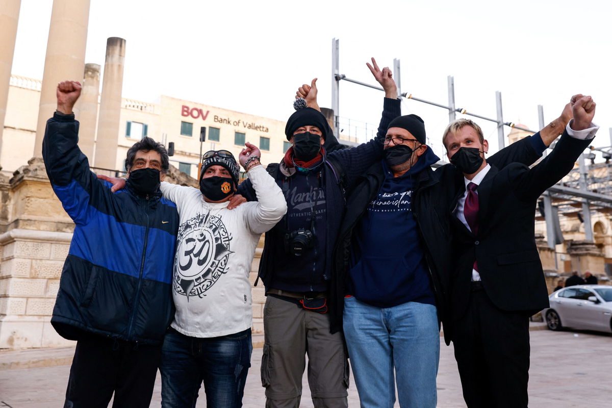 <i>Darrin Zammit Lup/Reuters</i><br/>Supporters of the cannabis bill in Malta celebrate outside Parliament House in Valletta