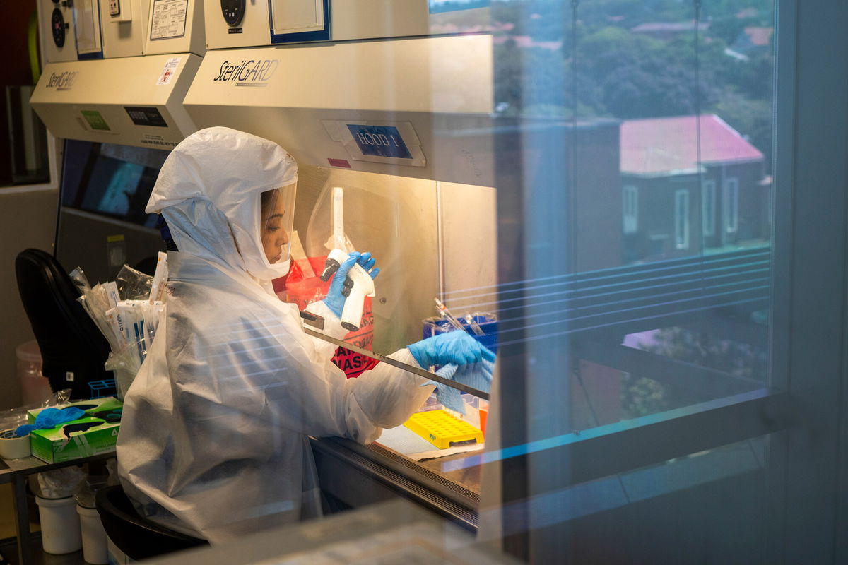 <i>Jerome Delay/AP</i><br/>Scientists at the Africa Health Research Institute in Durban